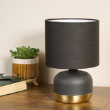 Modern black and gold touch table lamp with fabric drum shade