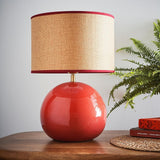 modern red ceramic table lamp with woven drum shade