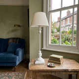 Classic white wood effect table lamp base featuring a turned spindle design and E14 fitting