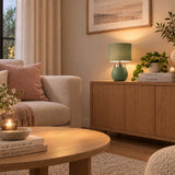 Sage Green table lamp with fabric drum shade and brushed metal detail