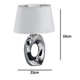 Contemporary silver sculptural base table lamp with white shade
