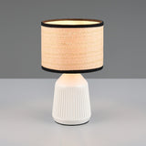 Decorative ceramic table lamp with ribbed white base and rattan shade