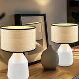 Boho style table lamp with white base and woven lampshade