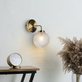 Waterproof bathroom wall light in antique brass